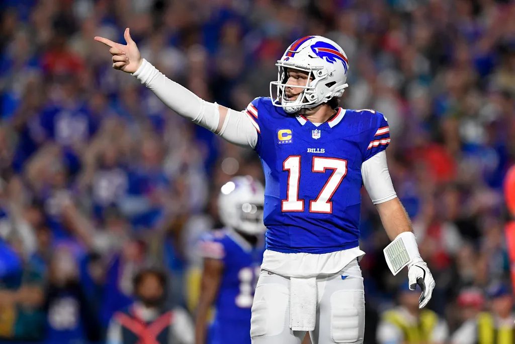 NFL quarterback in action, illustrating best ball stacking strategy